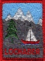 The badge was designed in the late seventies or early eighties. The old districts were changed and new areas were formed and Lochaber needed a badge. The Scouts were asked to design one and this is what was chosen as the winning design. For those that can't work it out (it's not that hard!) it indicates the mountains, trees and locha that we have - against that lovely blue sky